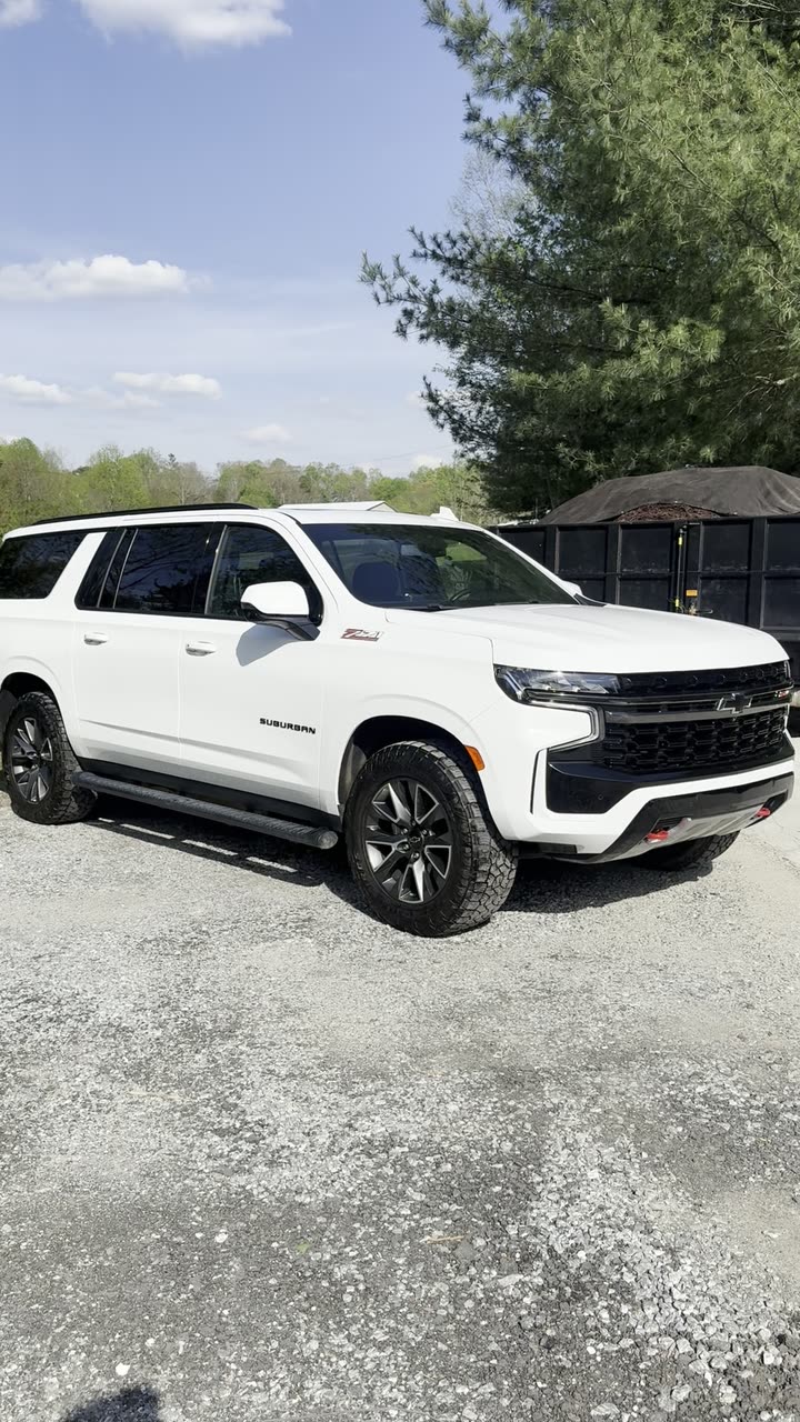 Finished white SUV detailed by Ramirez Car Wash